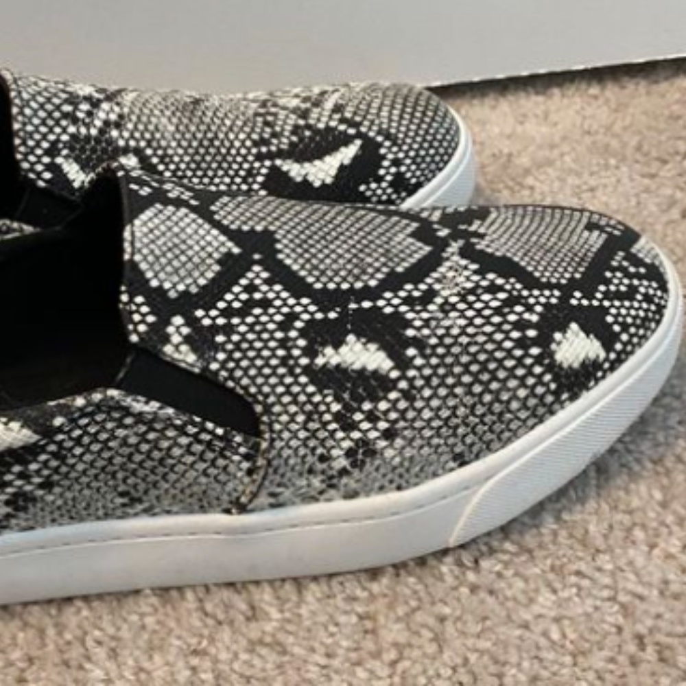 Snakeskin slip ons